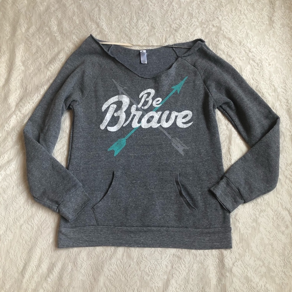 Be Brave off the shoulder pocket sweatshirt